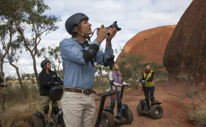 Quarter Uluru self-balancing scooter and sunset