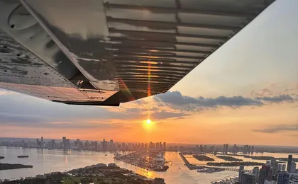 Miami night lights plane tour with champagne
