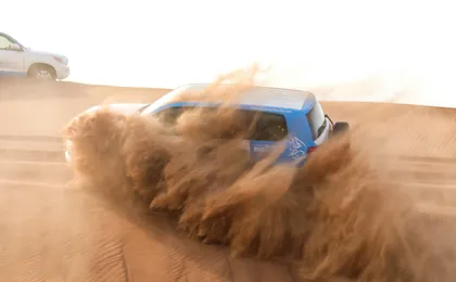 Abu Dhabi morning desert safari with camel ride