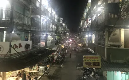 Ho Chi Minh City scooter food tour by night with a local host