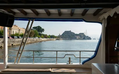 Boat trip from Corfu to Sivota with local lunch, Blue Lagoon and optional transfers