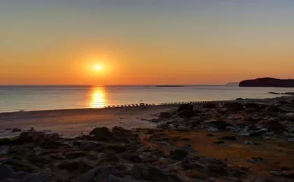 Falasarna sunset from the beach with transport and driver guide