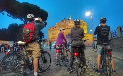 Rome at sunset is magic on two wheels